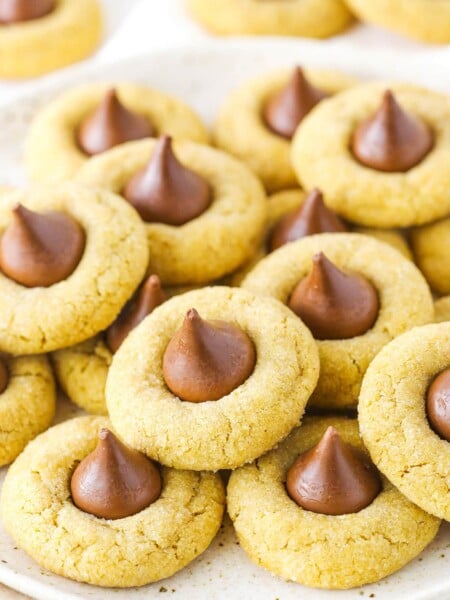 A stack of peanut butter blossom cookies