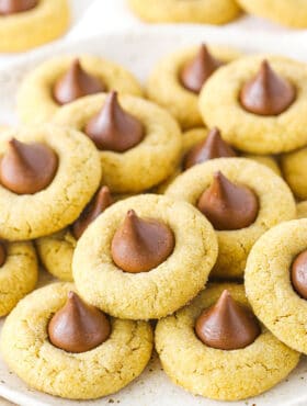 A stack of peanut butter blossom cookies