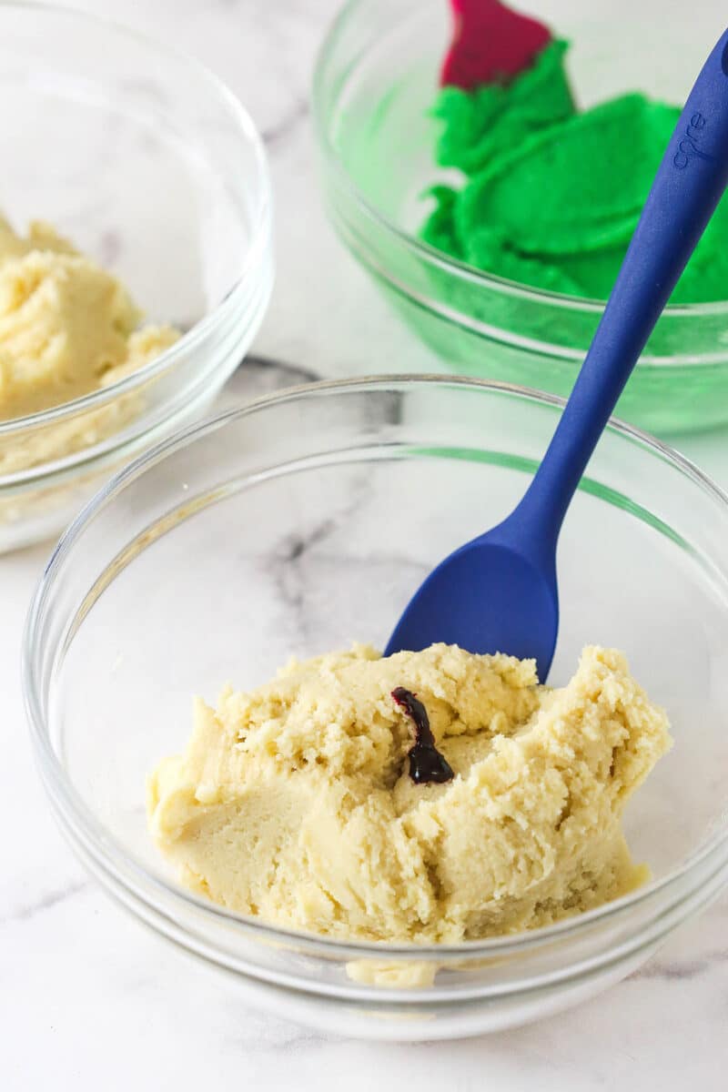 Spritz cookies are buttery, classic Christmas cookies made with a cookie press. This recipe is easy to make, with so many ways to decorate! Spritz cookie dough in a mixing bowl.