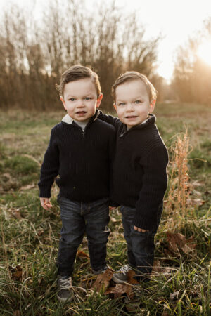Twins standing together