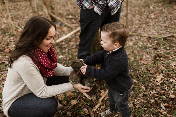 image of Ashton handing rocks to Lindsay