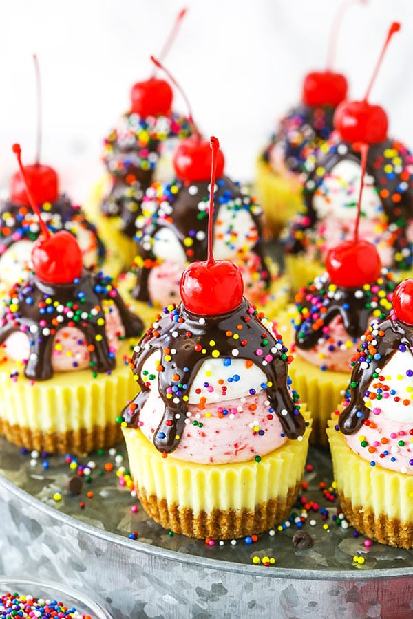 mini cheesecakes decorated to look like ice cream sundaes 