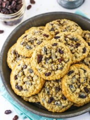 Overhead view of a grey plate stacked with homemade Oatmeal Raisin Cookies