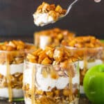 Side image of a Caramel Apple Trifle with a spoon lifting a spoonful out