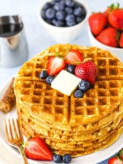 overhead of waffles on white plate without syrup