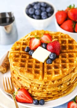 overhead of waffles on white plate without syrup