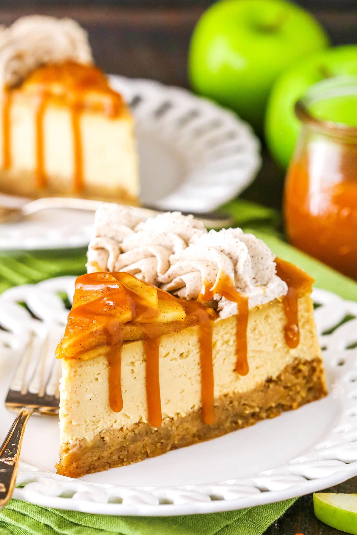 caramel apple blondie cheesecake slice on white plate