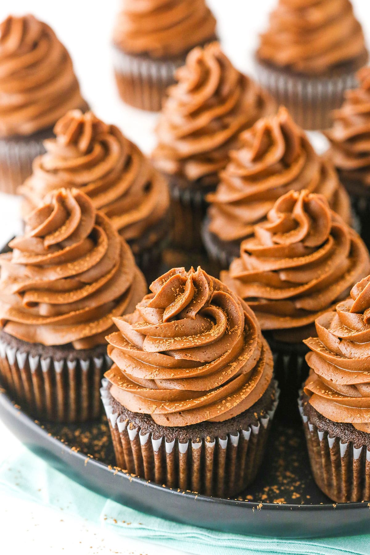 chocolate cupcakes on black platter