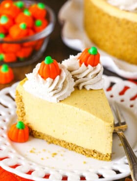 A Piece of No Bake Pumpkin Cheesecake on a White Plate with a Fork