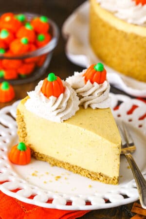 A Piece of No Bake Pumpkin Cheesecake on a White Plate with a Fork