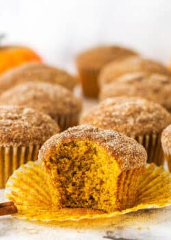 cinnamon sugar pumpkin muffin with bite taken out