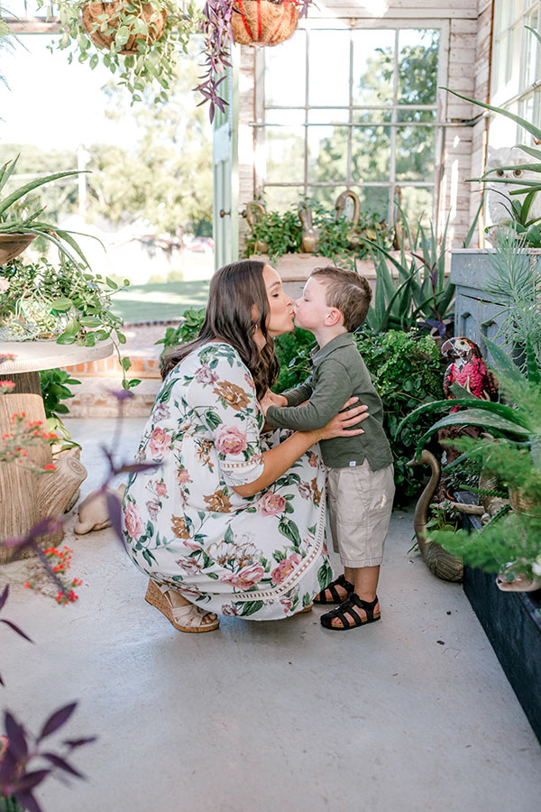 Brooks giving Lindsay a kiss