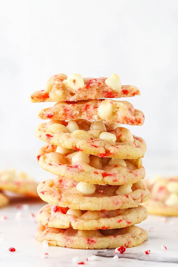 White Chocolate Peppermint Sugar Cookies Stacked on a Countertop
