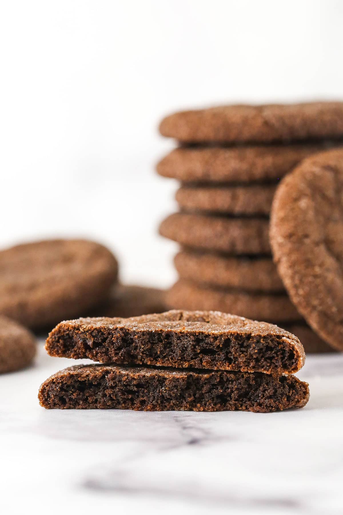 A Chocolate Sugar Cookie Cut in Half to Show the Chewy Inside