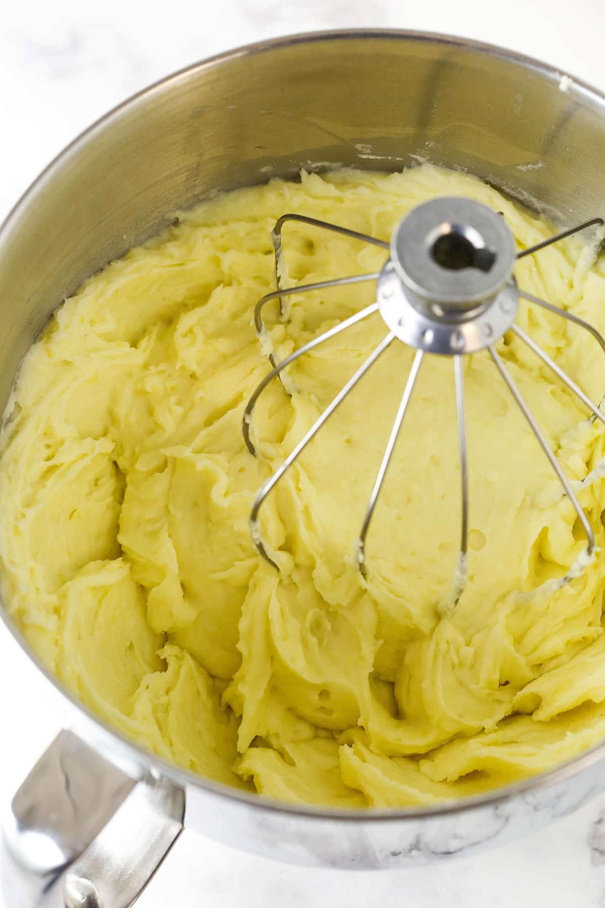 Step 6 use the whisk attachment of your mixer to mix, blend and smooth potatoes