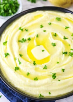 creamy mashed potatoes with parsley on top