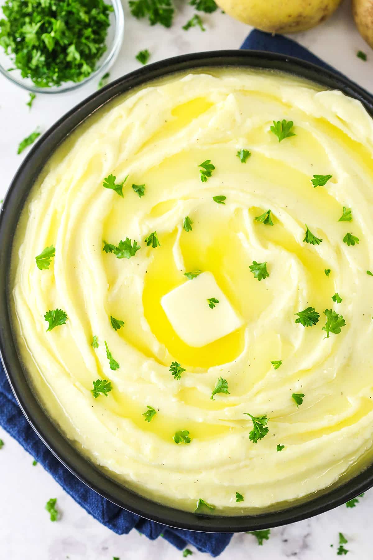 creamy mashed potatoes with melted butter on top