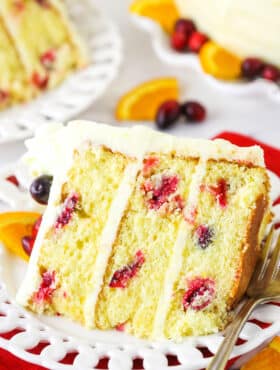 Overhead view of a slice of Cranberry Orange Layer Cake on it's side.