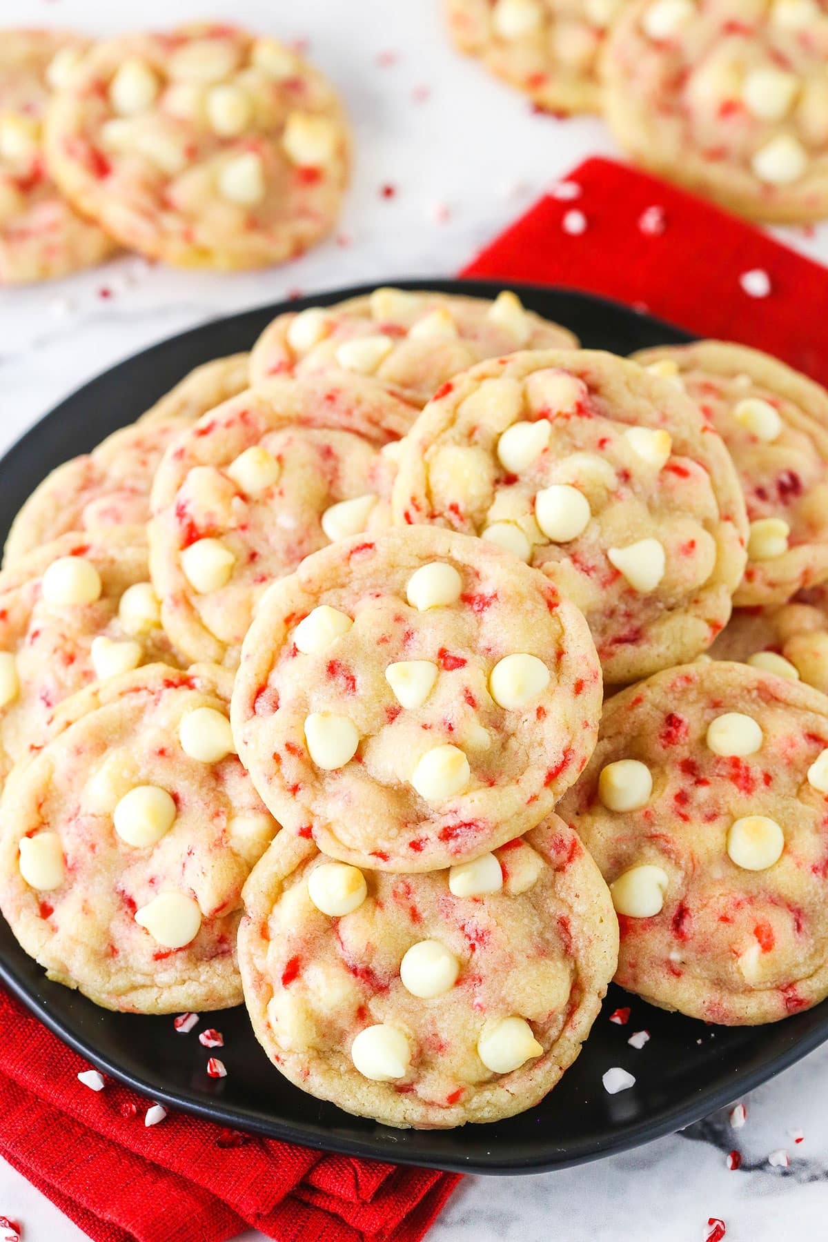 A serving plate full of white chocolate peppermint sugar cookies.