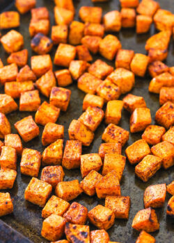 A Pan Full of Roasted Sweet Potatoes with Light Browning