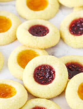 Thumbprint Cookies Filled with Apricot and Raspberry Jam