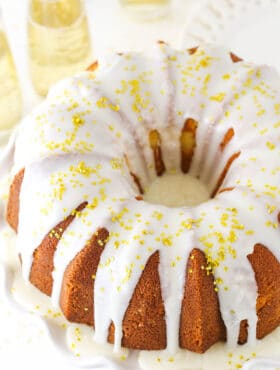 A Champagne Pound Cake Topped with Gold Sprinkles.