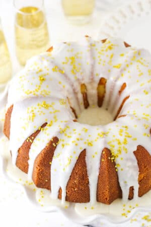 A Champagne Pound Cake Topped with Gold Sprinkles.