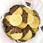 A Tin Filled with Butter Cookies and Lined with Parchment Paper