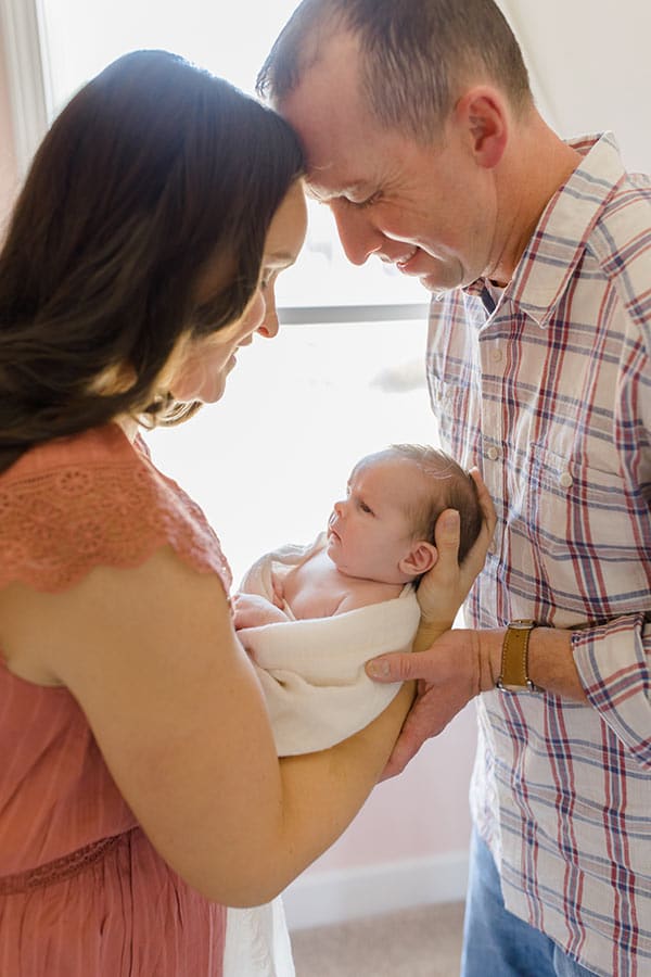 Lindsay and the hubs holding McKenzie