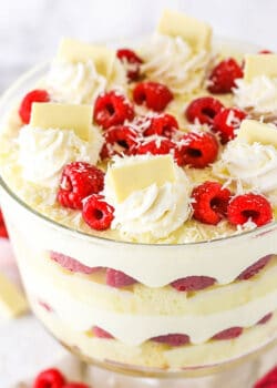 A Three-Layer White Chocolate Raspberry Trifle with Chocolate Shavings on Top