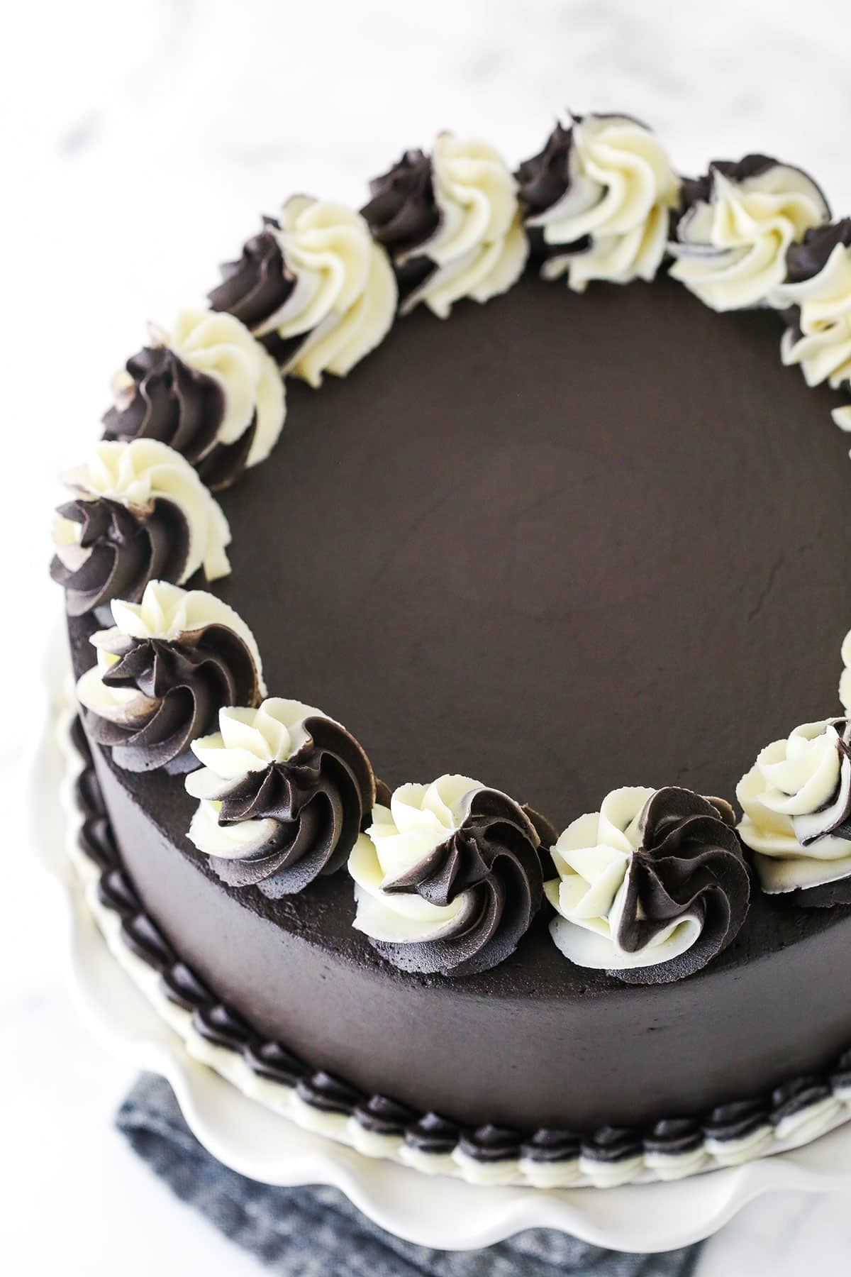 Overhead view of a frosted chocolate and vanilla Zebra Layer Cake.