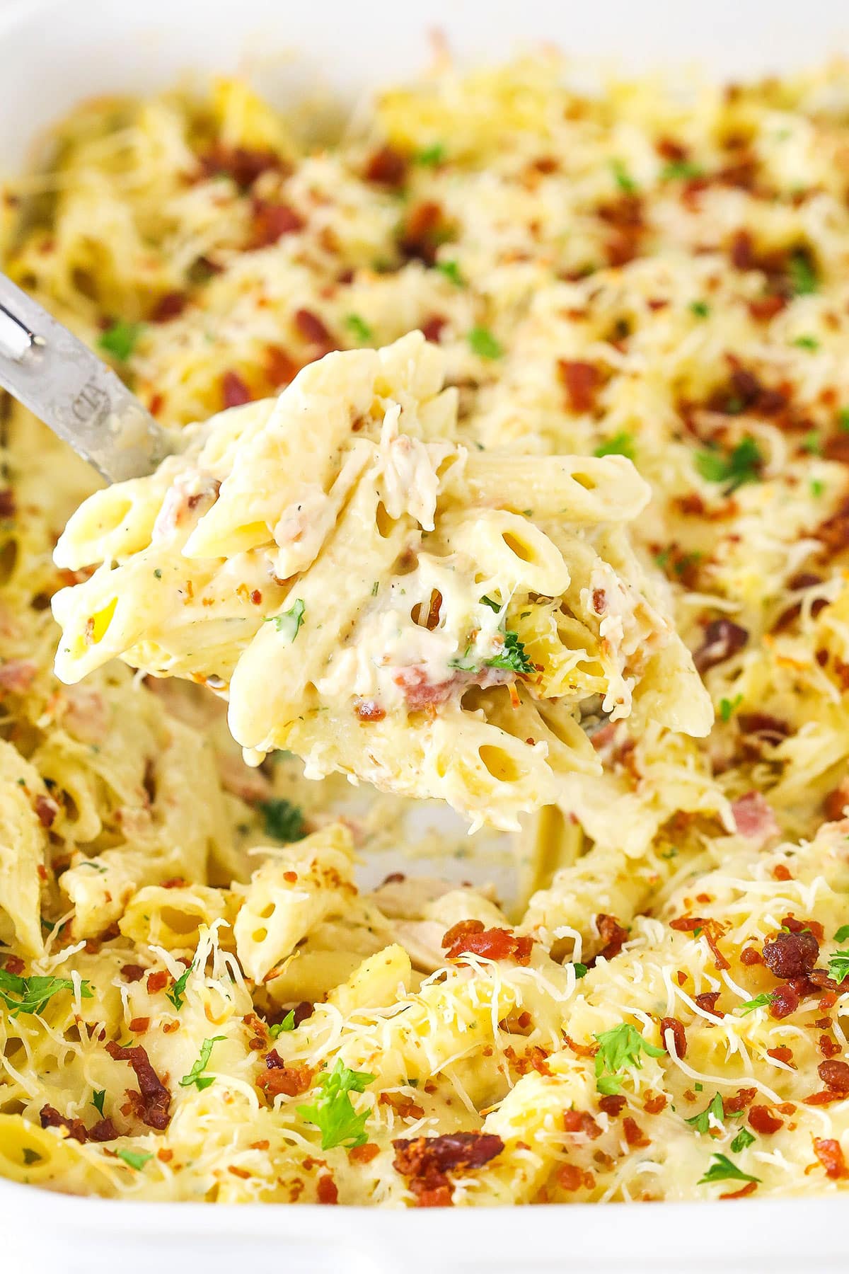 Close-up of chicken bacon ranch casserole with melty cheese.