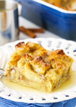 One Serving of Bread Pudding on a White Plate