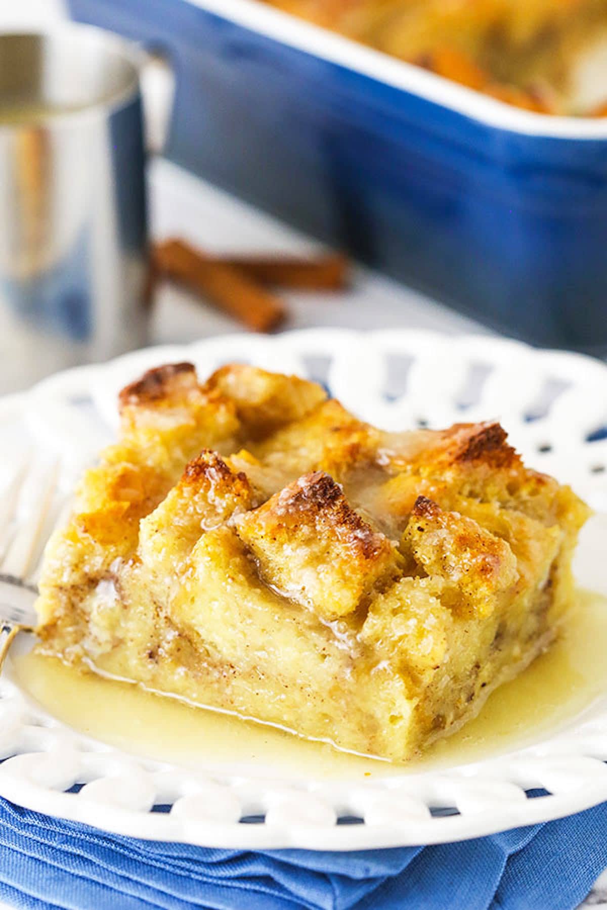 One Serving of Bread Pudding on a White Plate