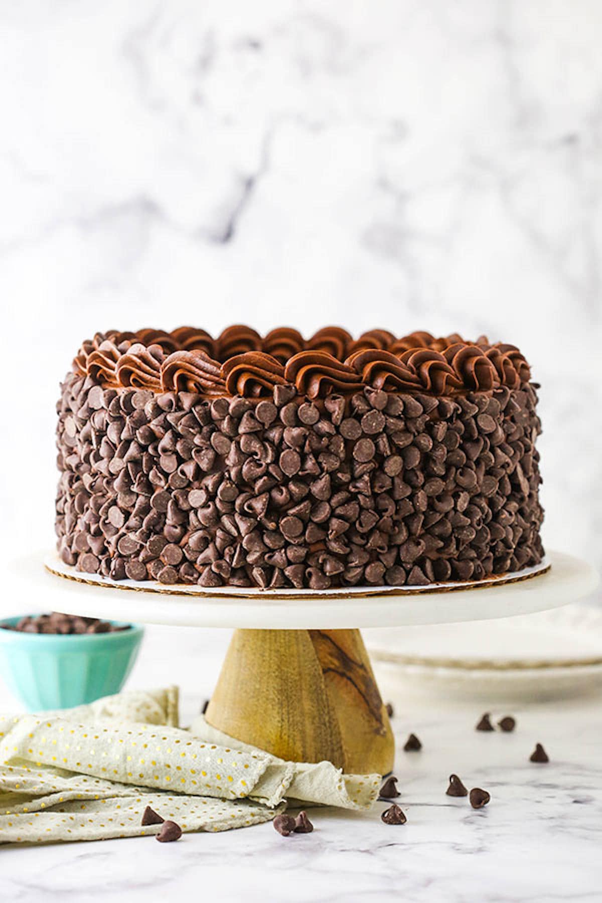 A Wooden Cake Stand Holding a Hershey's Chocolate Cake Cheesecake