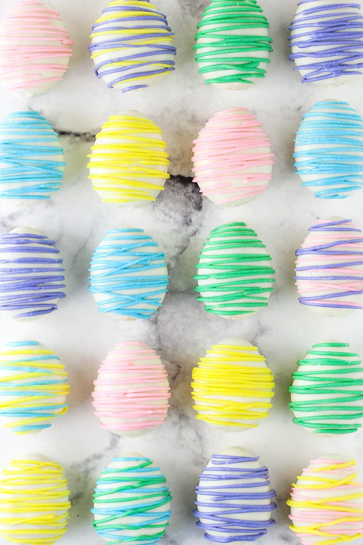 easter egg oreo cookie balls laid out on marble table