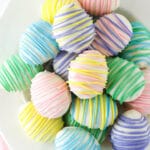 overhead image of easter egg oreo cookie balls in a white bowl