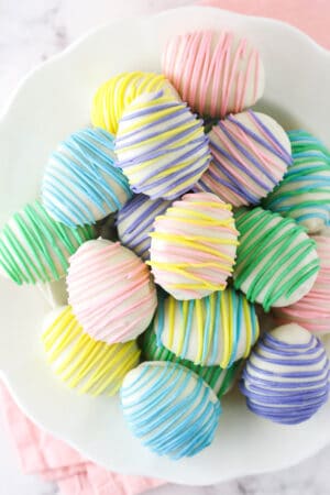 overhead image of easter egg oreo cookie balls in a white bowl