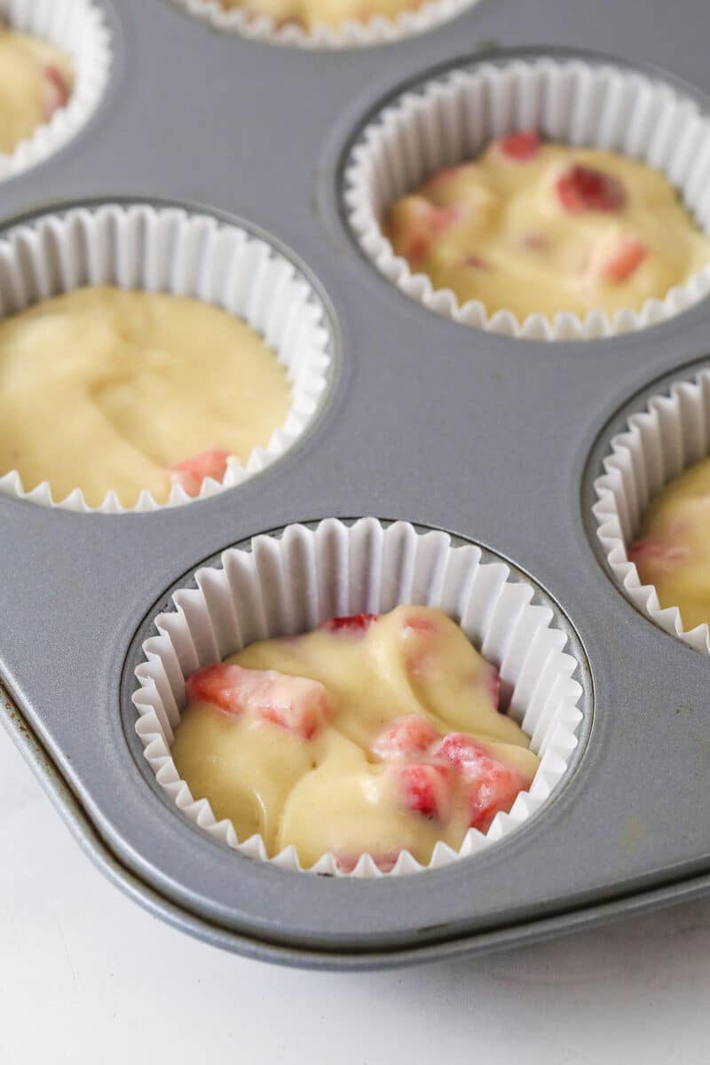 cupcake batter in cupcake liners in cupcake pan