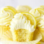 A Frosted Lemon Cupcake with One Bite Taken Out