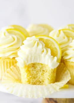 A Frosted Lemon Cupcake with One Bite Taken Out