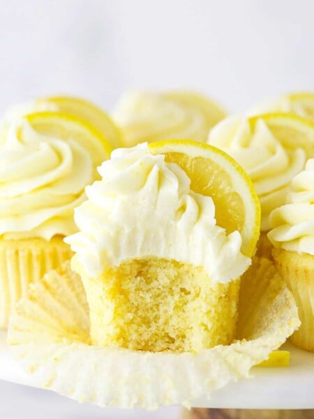 A Frosted Lemon Cupcake with One Bite Taken Out
