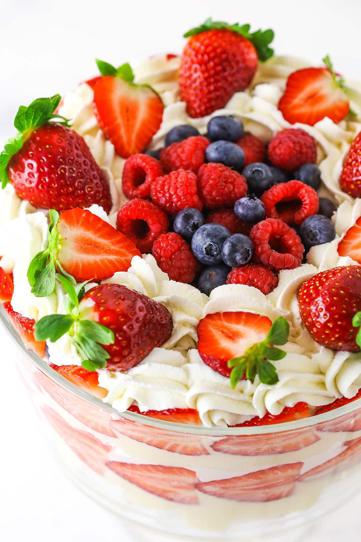 finished and decorated berry trifle in glass trifle dish