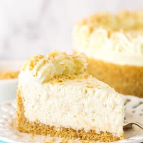 Side view of a slice of no bake toasted coconut cheesecake