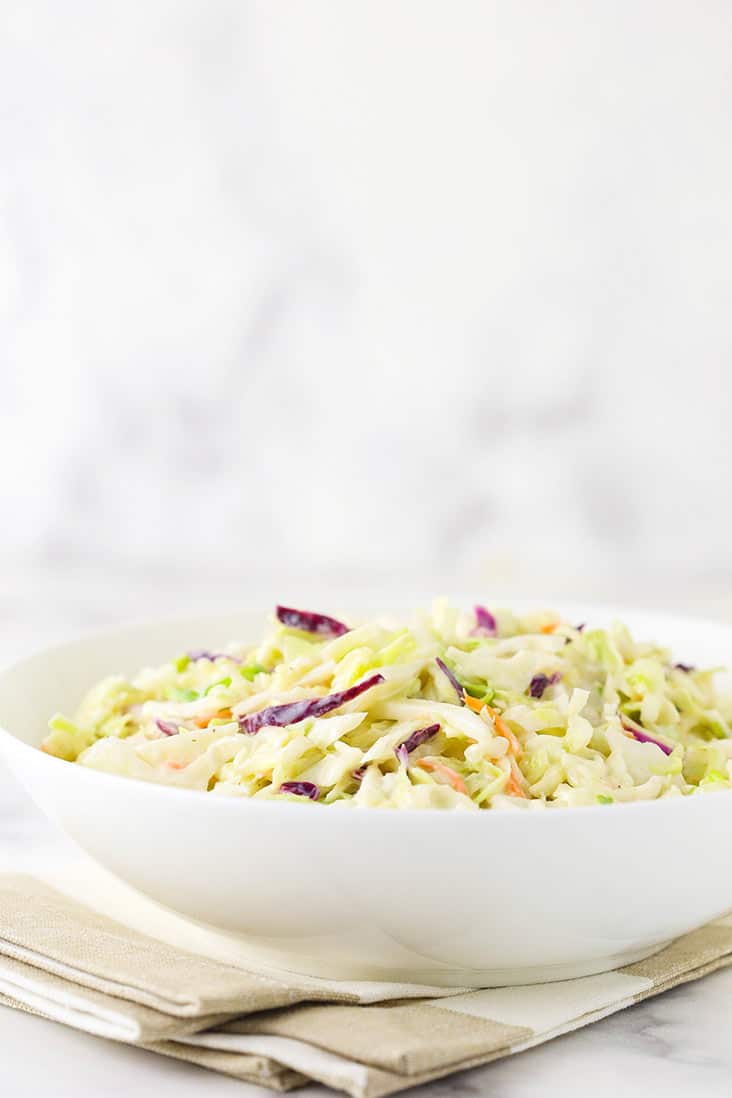 Classic coleslaw in a white bowl