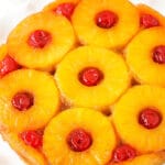 A pineapple upside down cake with cherries