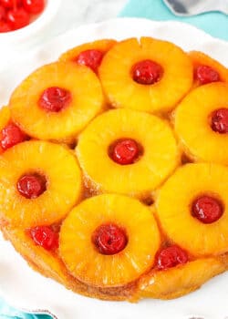 A pineapple upside down cake with cherries