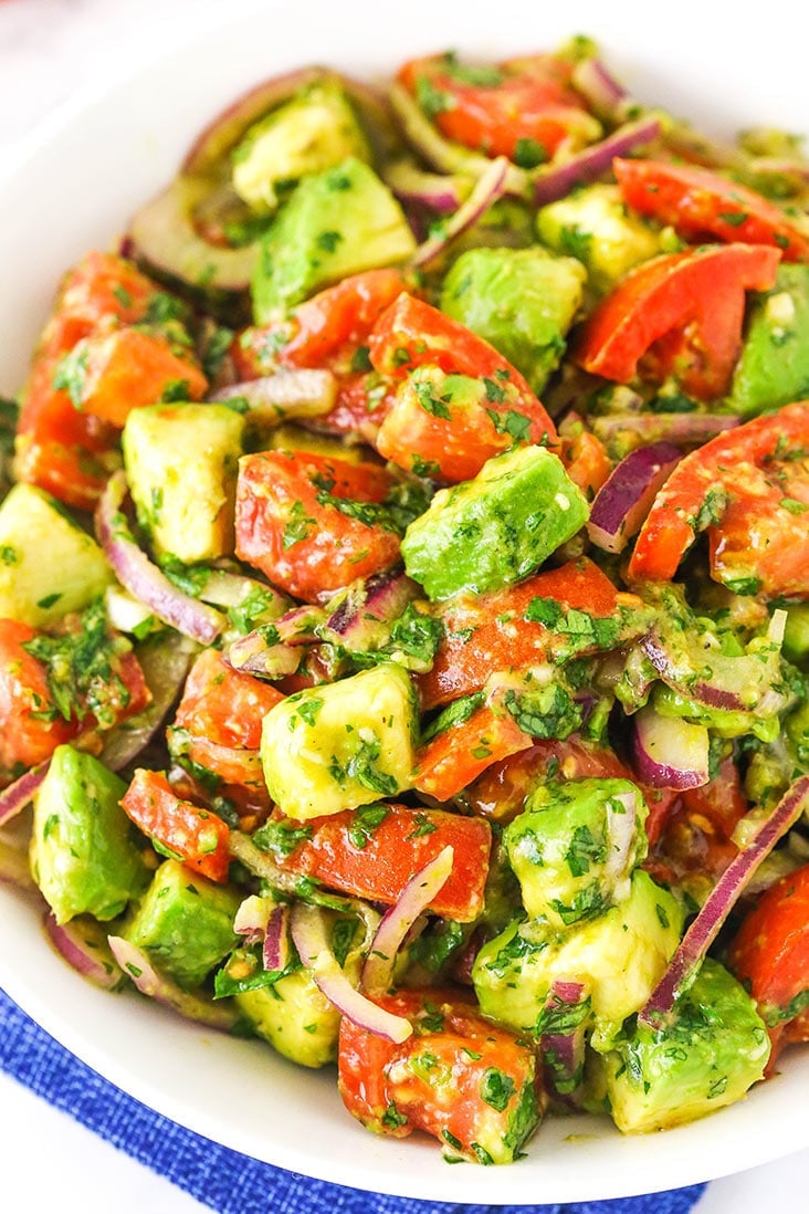 A close up of tomato avocado salad