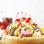 banana split cheesecake from the side on metal serving tray