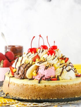 banana split cheesecake from the side on metal serving tray